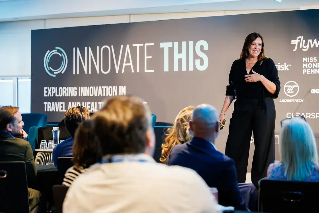 Kate Southerby speaking on stage at Innovate This 2025