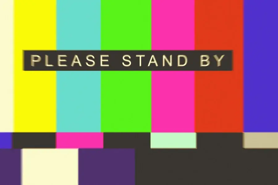Retro television colour bars with the words please stand by