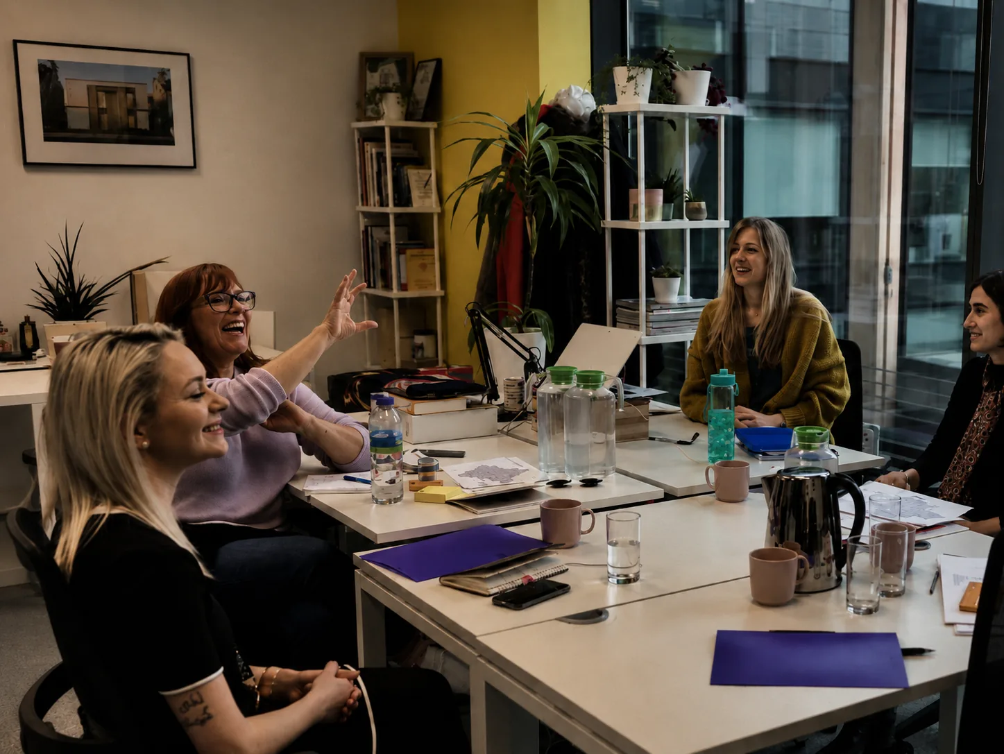 Kiss House team in a relationship intelligence workshop conversation